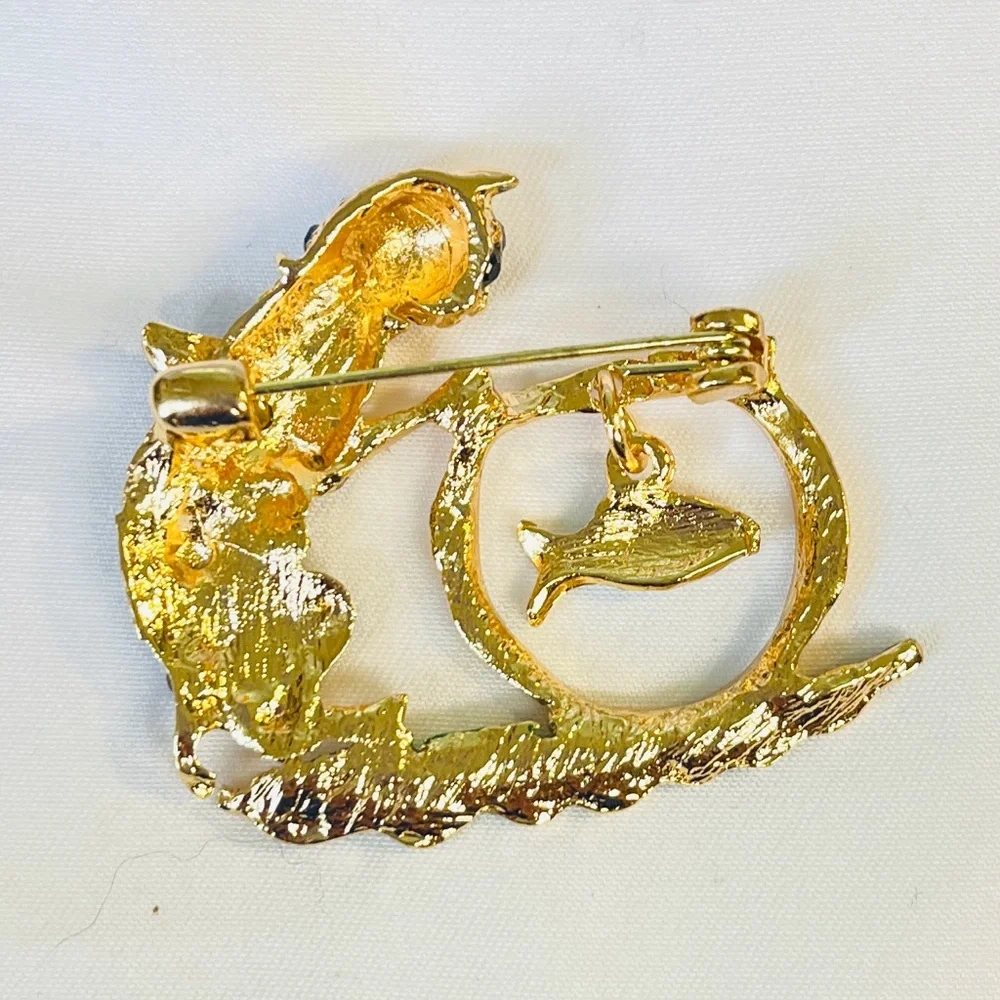 Brooch, Cat and Fish, NIP, blue rhinestones on golden base, 1.75x1.5”